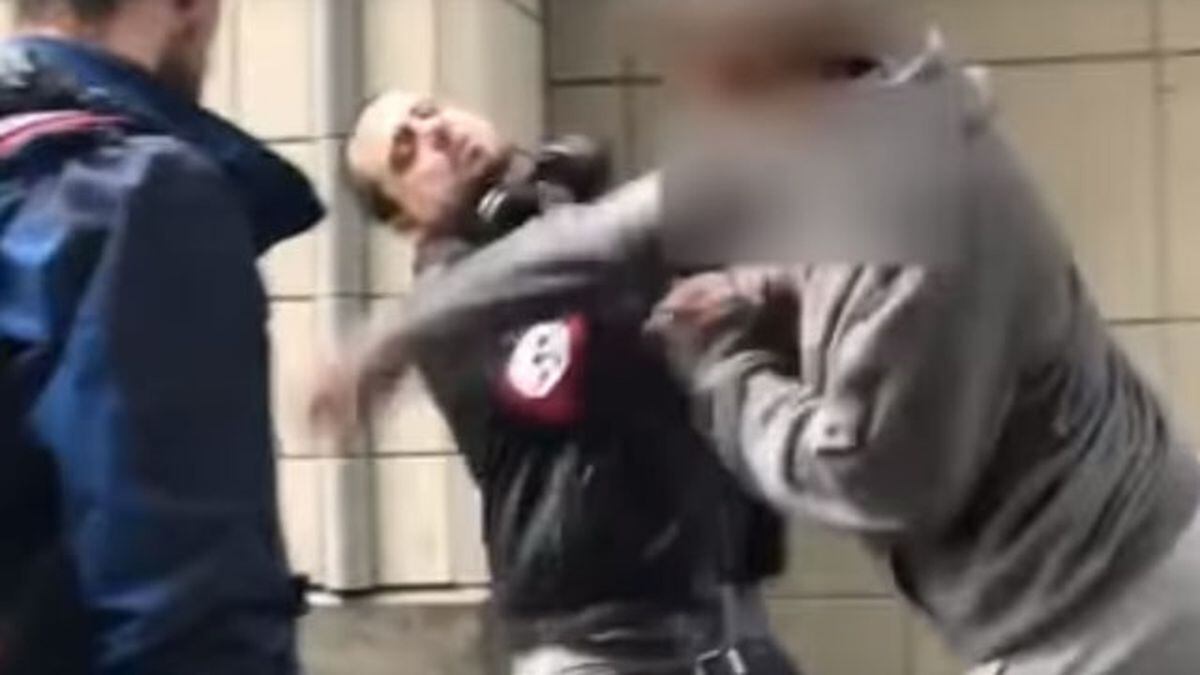 Man with swastika armband gets punched in downtown Seattle while yelling at  people