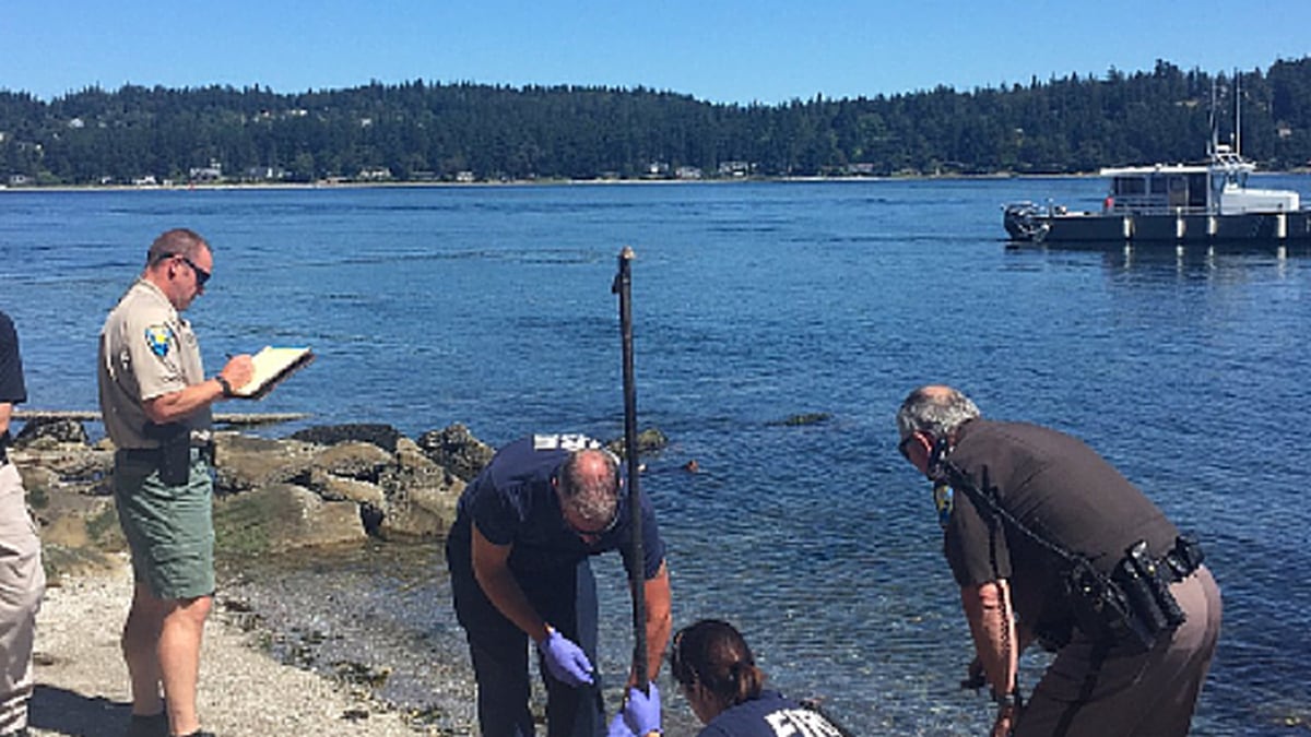 Detectives investigating woman's body found on Kitsap Co. beach.