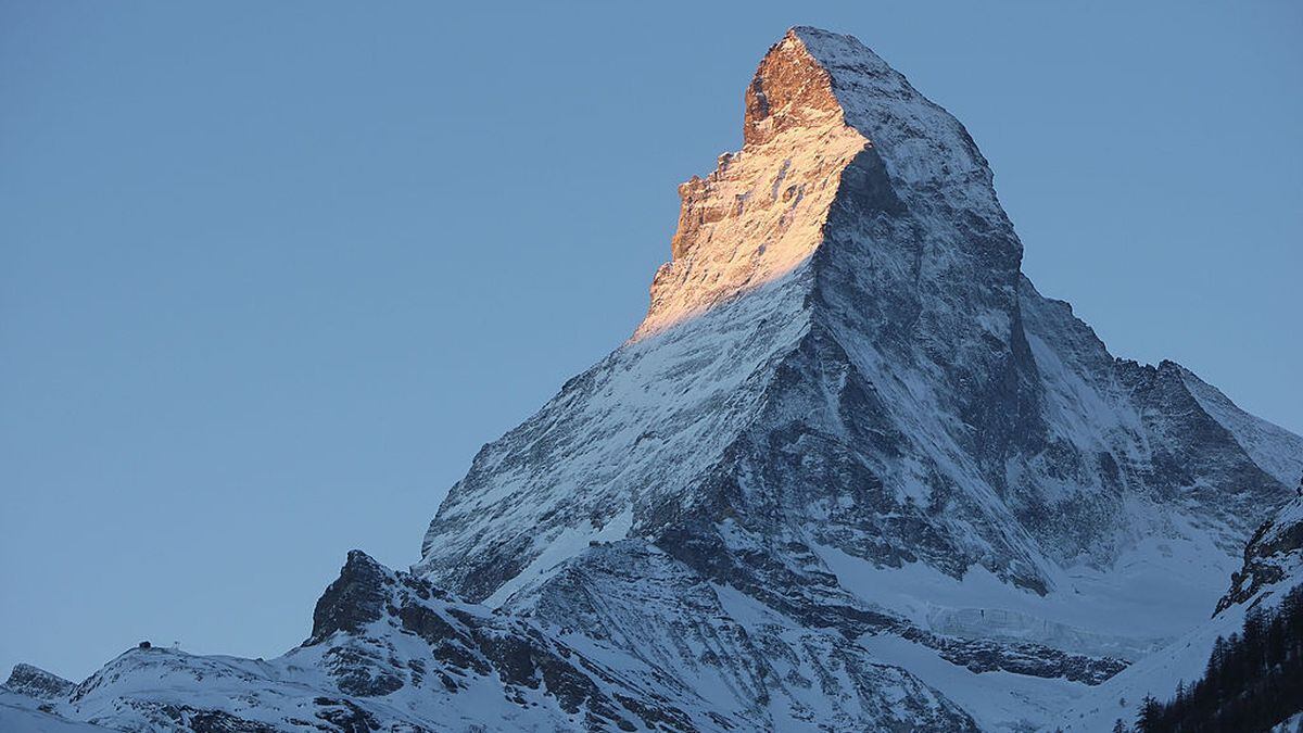 FILE PHOTO: Historically neutral Switzerland symbolically showed its support for the U.S. in the fight against the coronavirus pandemic by projecting an image of the American flag onto the side of the iconic Matterhorn portion of the Swiss Alps.